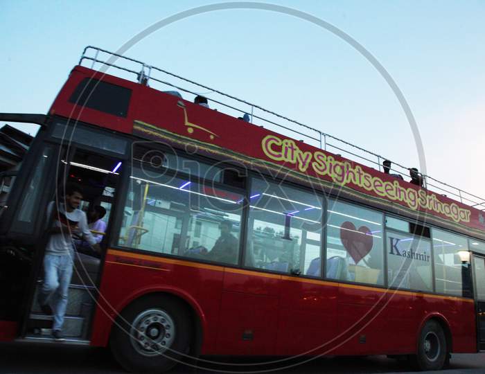 People moving in a double-decker bus in Kashmir