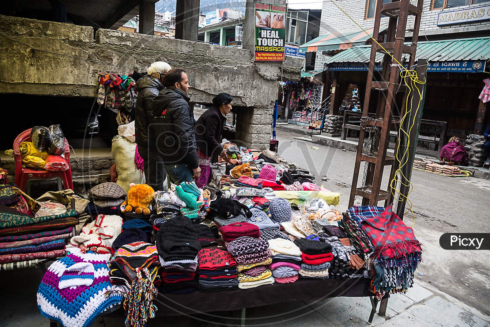 Manali , Himachal Pradsh, India - January 21, 2019 : Vendors Selling Woolen Clothes And Other Handmade Traditional Winters Products Near Mall Road, Manali Street Baazar Market - Image