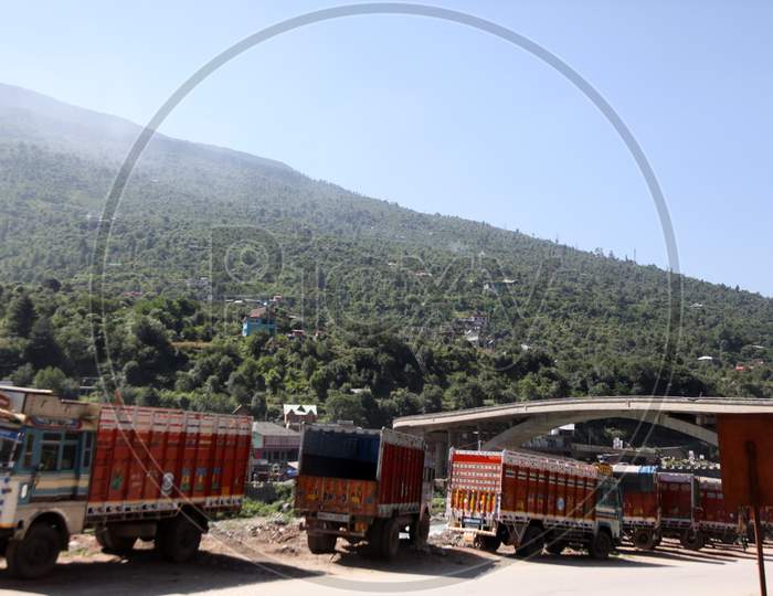 Mountains of Himachal Pradesh with Heavy Vehicles in the Foreground