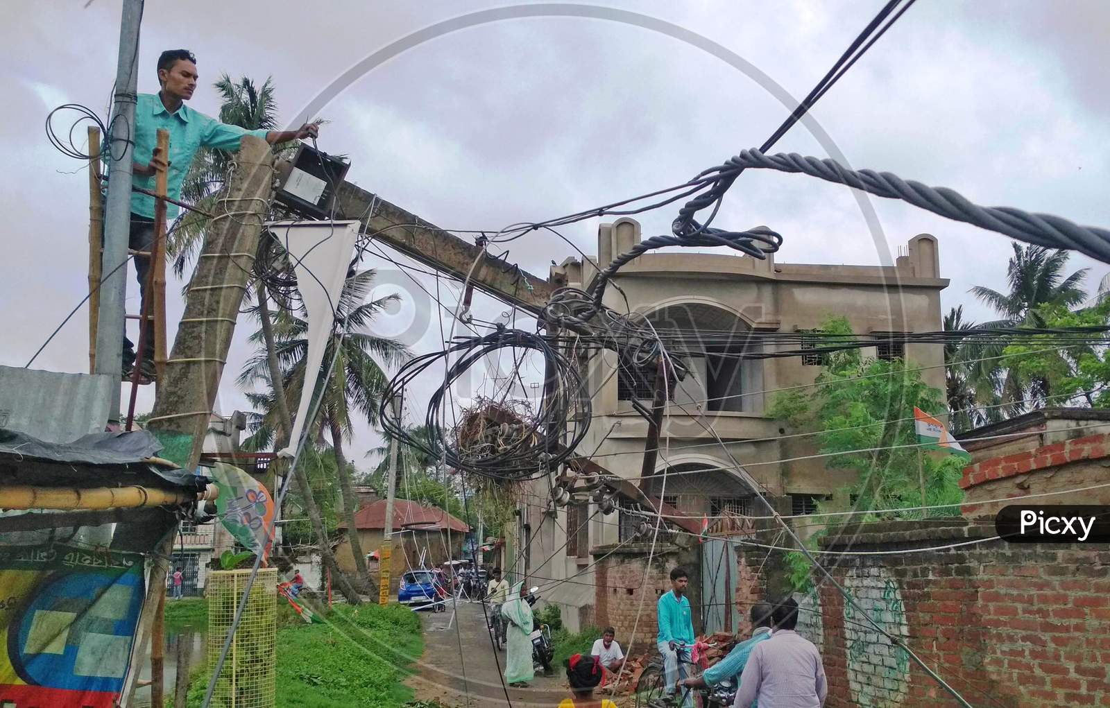The electricity poles have broken during Cyclone Amphan in Burdwan town.