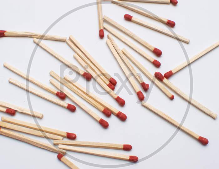 Matchsticks on a white background with spaces in between