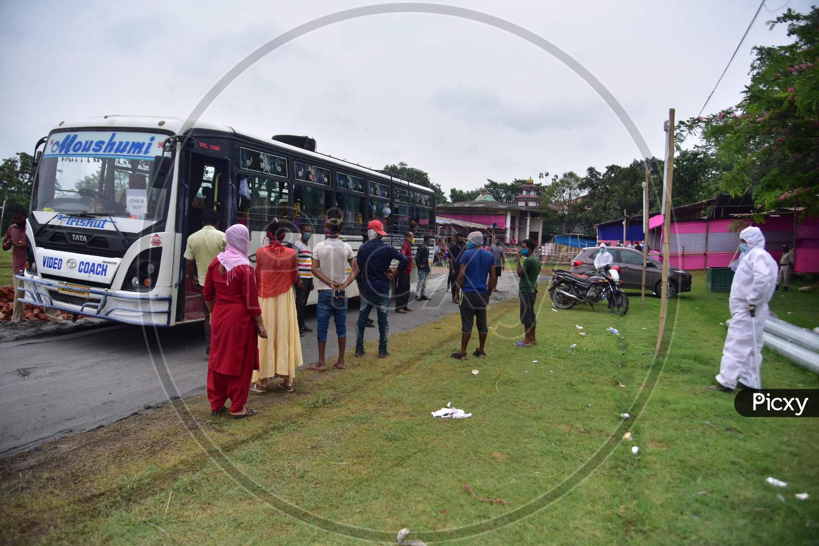 Migrants Arriving From Kerela  Via Train Boarding  A Bus For Quarantine Center   During Extended Nationwide Lockdown Amidst Coronavirus or COVID-19 Pandemic in Nagaon  on  may 24,2020