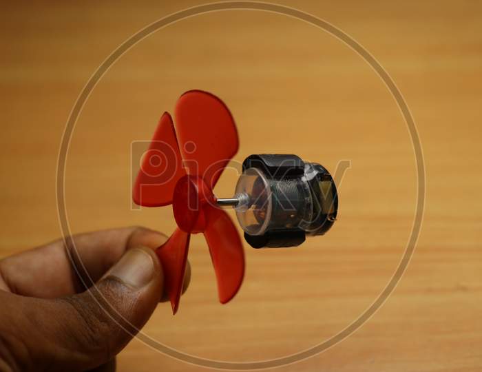 Transparent Type Dc Motor With Attached Propeller To Its Shaft