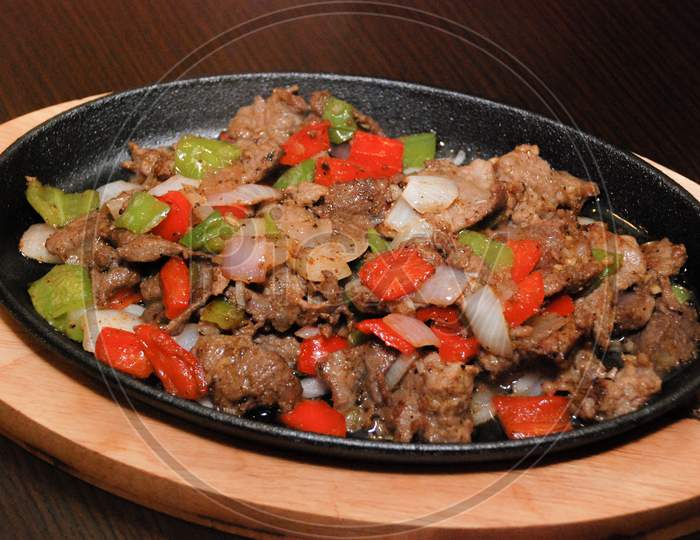 Fried Beef With Green And Red Bell Pepper And Onion