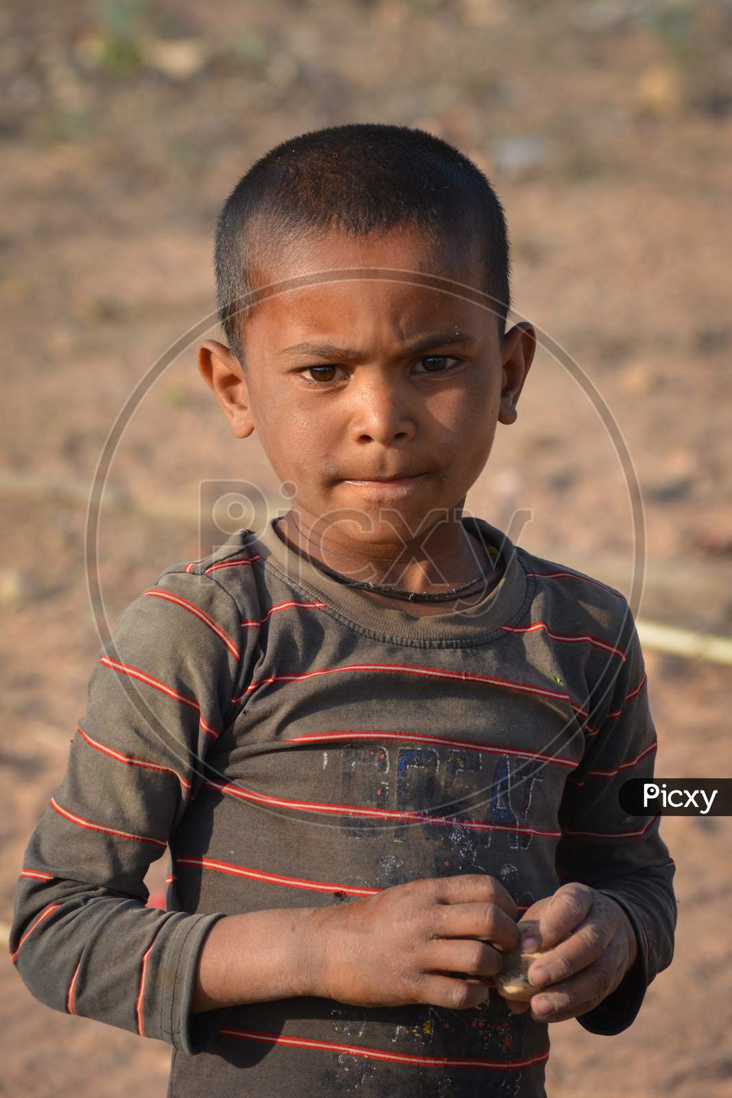TIKAMGARH, MADHYA PRADESH, INDIA - MARCH 24, 2020: Portrait of unidentified Indian boy at their village.