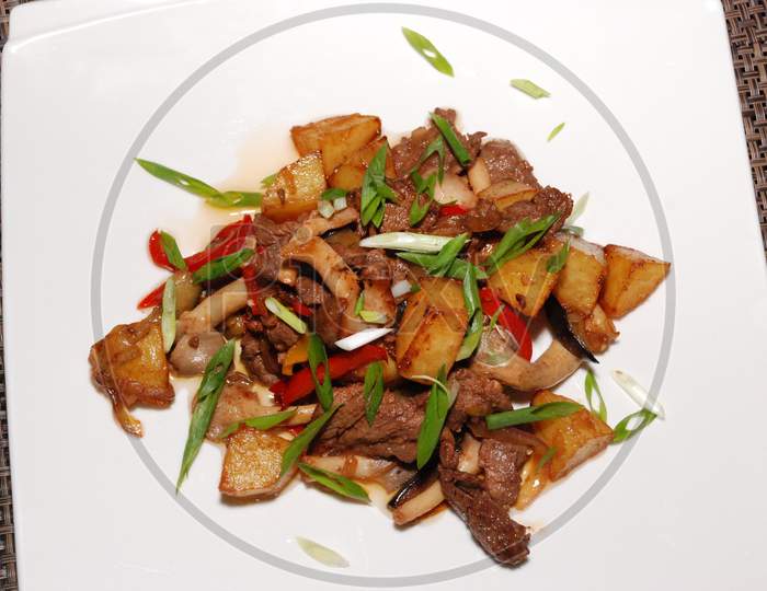 Fried Beef With Green Onion And Potatoes