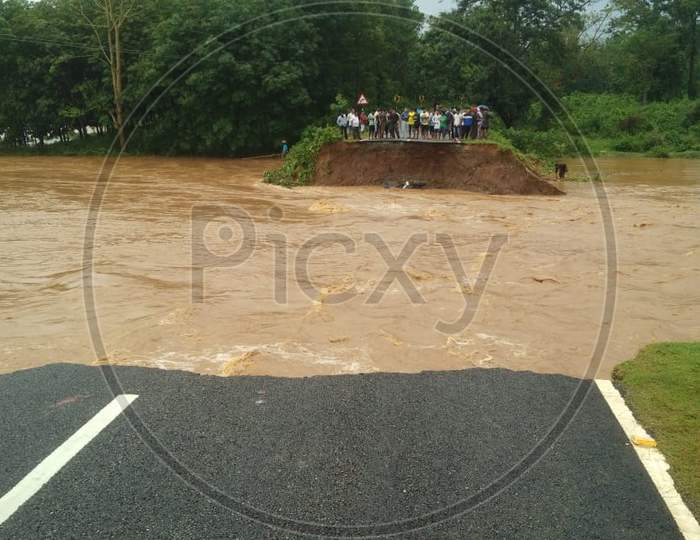 Floodwaters Washed Away A Portion Of A State PWD Road At The Agia-Lakhipur Area In The Goalpara District Of Assam On Sunday.may 24,2020