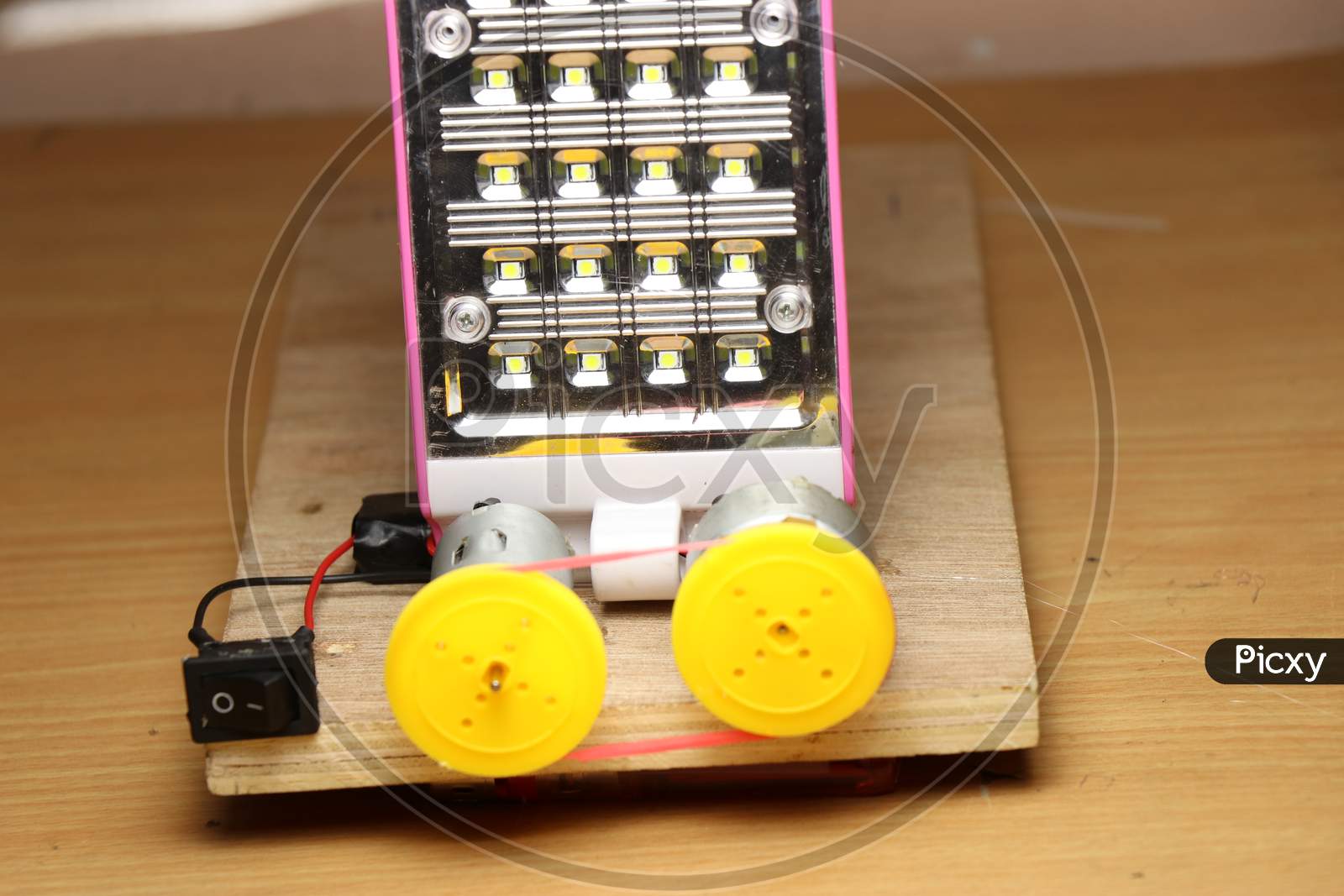 Image of Mini Generator Made From Old Dc Motor And Led Light Panel