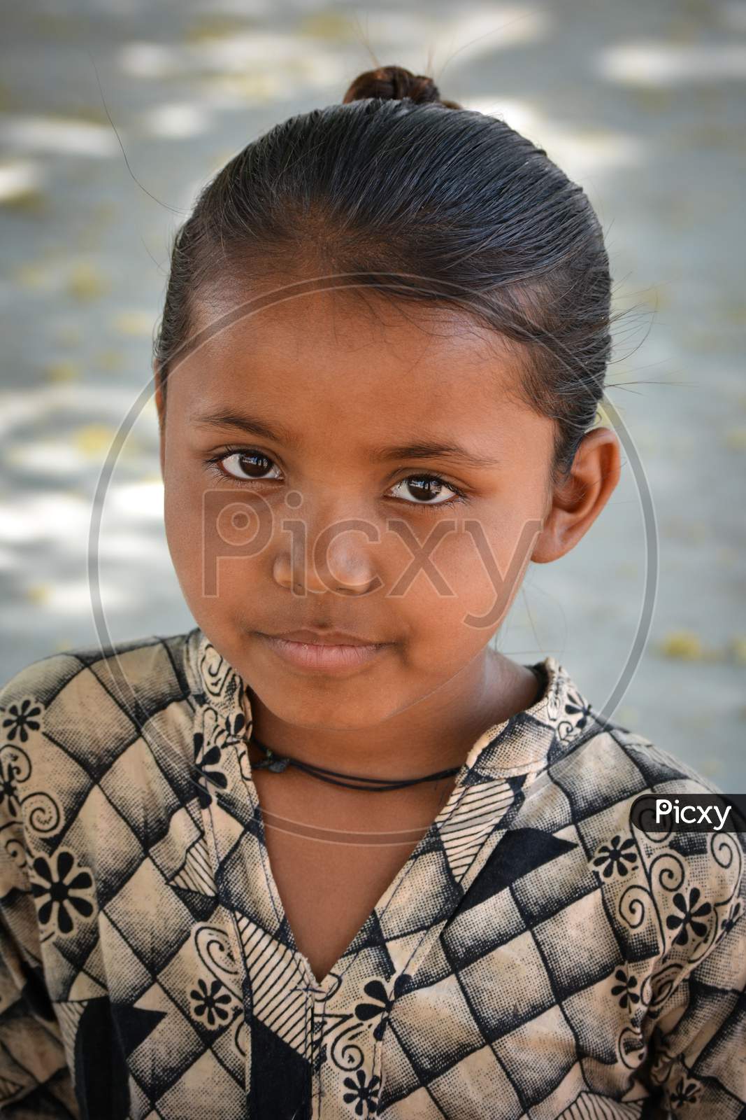 TIKAMGARH, MADHYA PRADESH, INDIA - MAY 03, 2020: Portrait of indian village girl.