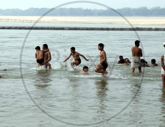 Hindu Devotees Taking Holy Bath In Triveni Sangam River on a Hot Summer Day  During Extended Nationwide Lockdown Amidst Coronavirus Or COVID-19 Pandemic in Prayagraj, May 24,2020