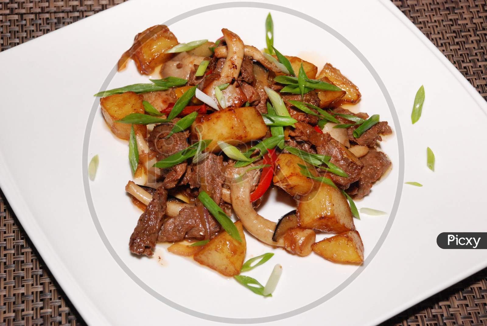 Fried Beef With Green Onion, Mushrooms And Potatoes