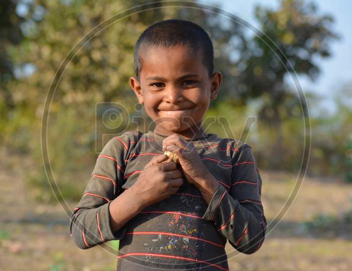 TIKAMGARH, MADHYA PRADESH, INDIA - MARCH 24, 2020: Portrait of unidentified Indian boy at their village.