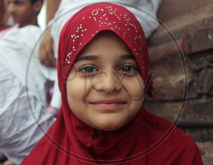 New Delhi, Delhi / India- May 05 2020: Portrait Of A Muslim Girl In Proper Traditional Dress In Jama Masjid