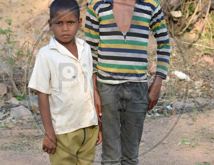 TIKAMGARH, MADHYA PRADESH, INDIA - MARCH 24, 2020: Happy rural Indian village boys.
