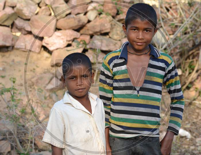 TIKAMGARH, MADHYA PRADESH, INDIA - MARCH 24, 2020: Happy rural Indian village boys.