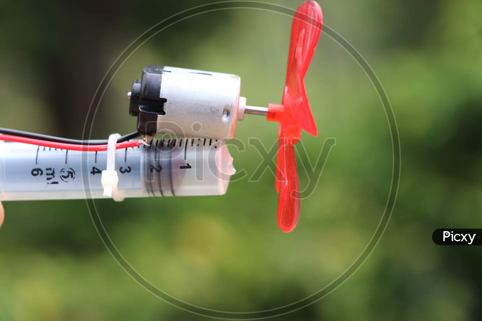 Dc Motor With Plastic Propeller Attached To Its Shaft Which Is Used As Fan