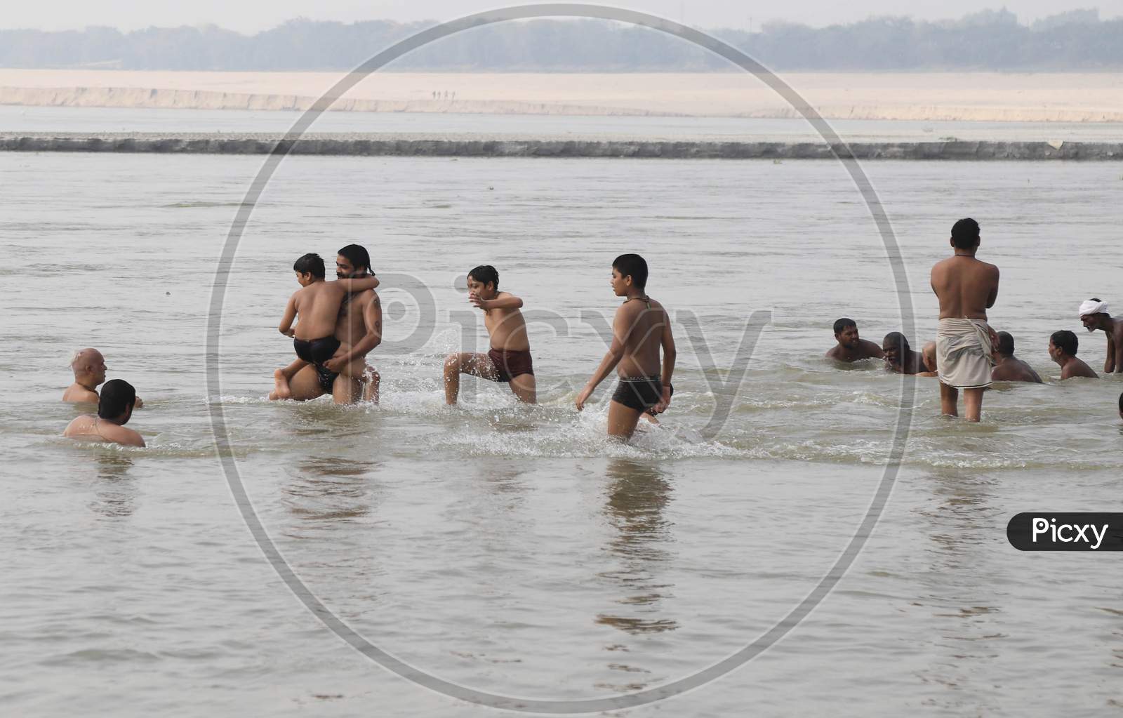 Hindu Devotees Taking Holy Bath In Triveni Sangam River on a Hot Summer Day  During Extended Nationwide Lockdown Amidst Coronavirus Or COVID-19 Pandemic in Prayagraj, May 24,2020