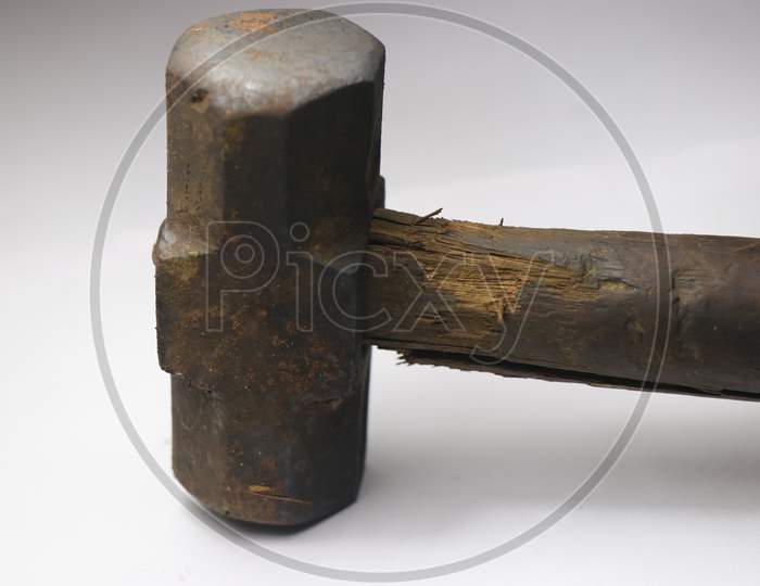 Antique Hammer Which Looks Rusty And Having Wooden Handle