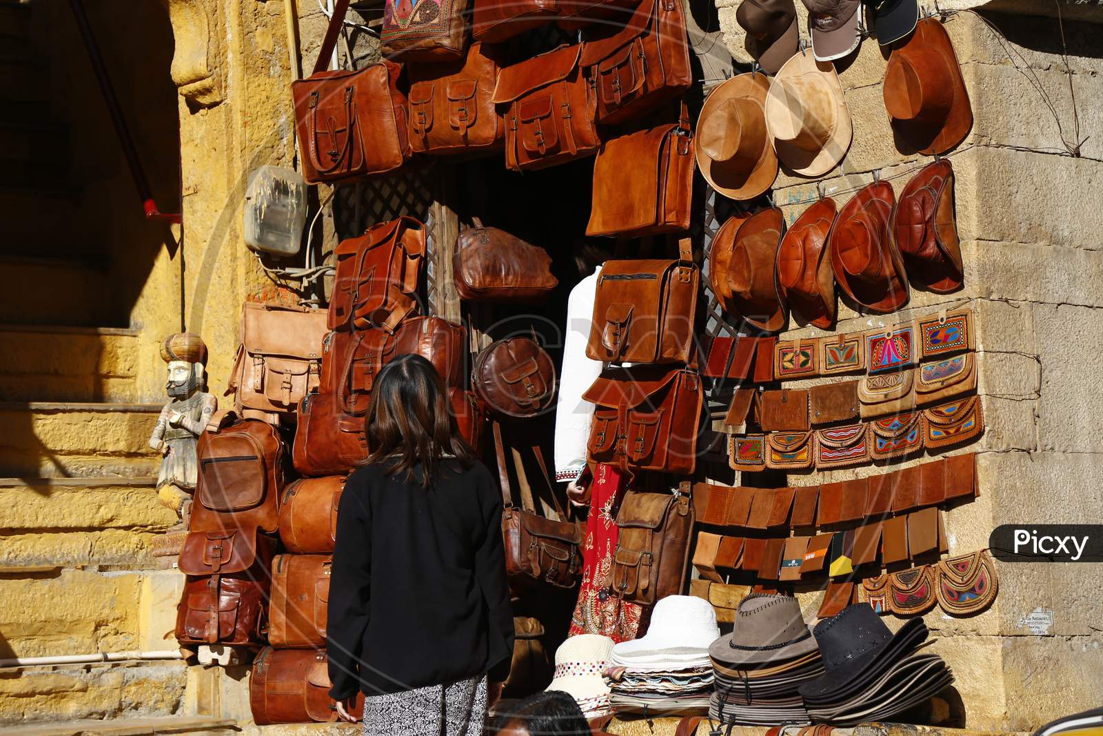 Vendor Stalls With Hats And Caps At Jaisalmer Desert Festival, Rajasthan, India