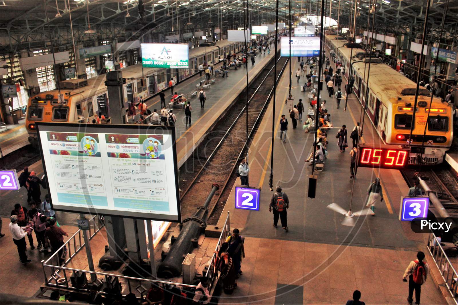 A screen displaying preventive measures to combat COVID-19 and the thinning of crowd at the usually packed Churchgate station is seen amid the spread of Coronavirus in Mumbai, India on 18th March 2020.