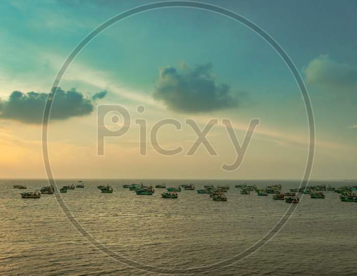 Sky View With Anchored Fishing Boats In Sea