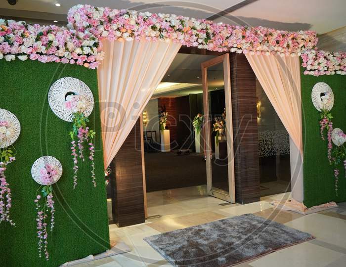 Floral Wedding Decoration Element. Lights, Entrance Gate, Shower, Flowers, Couple Stage. Closeup Beautiful Flowers Wedding Arch At The Entrance Of The Banquet Hall - Chandigarh India December 2019