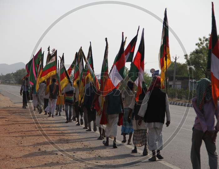 Muslim Devotees As a procession Carrying Flags During Urs In Ajmer, Rajasthan