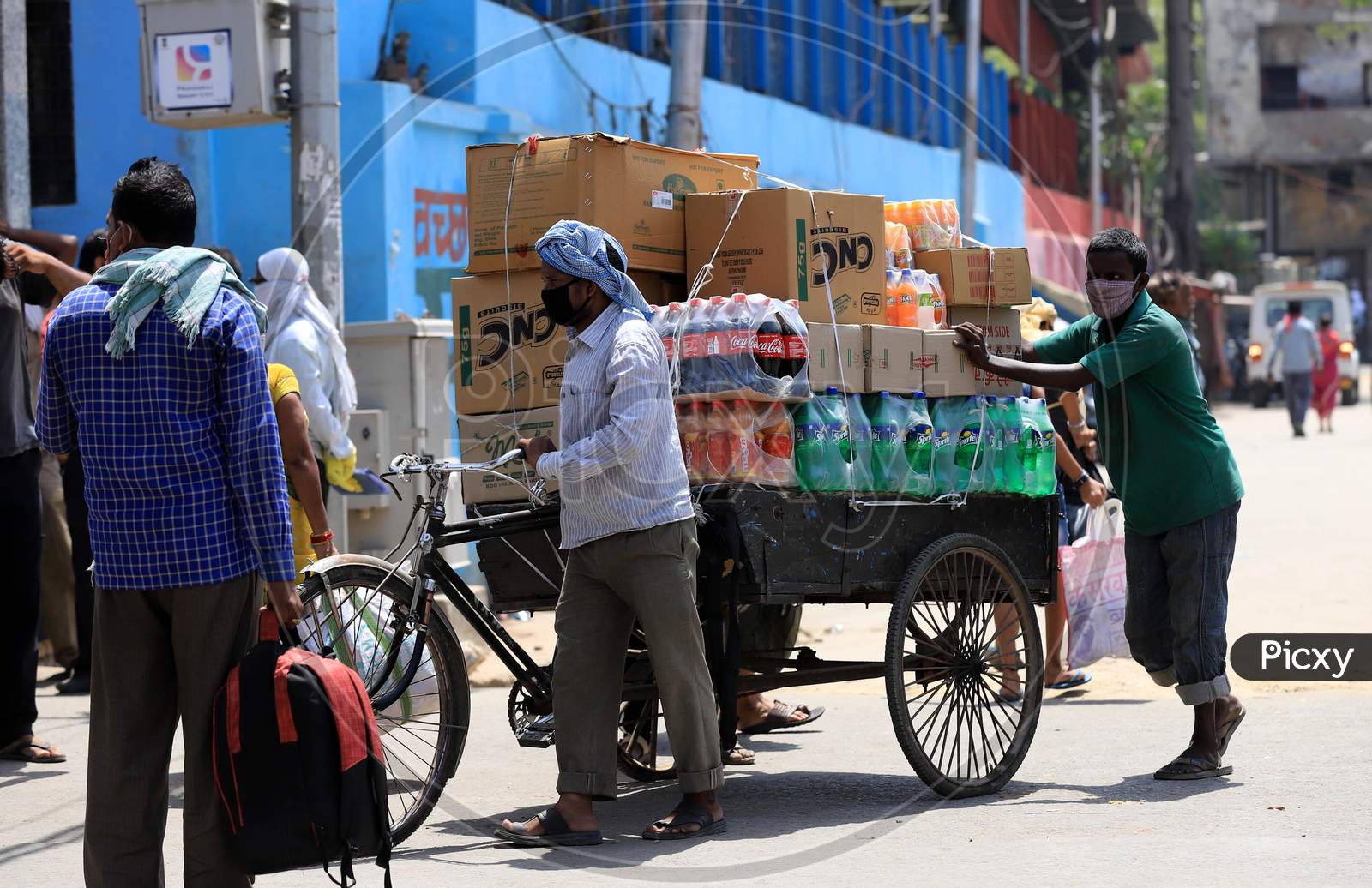 Vendors Transport Cold Drinks On A Trolly On A Hot Summer Day During Extended Nationwide Lockdown Amidst Coronavirus Or COVID-19 Pandemic In Prayagraj, May 25, 2020.