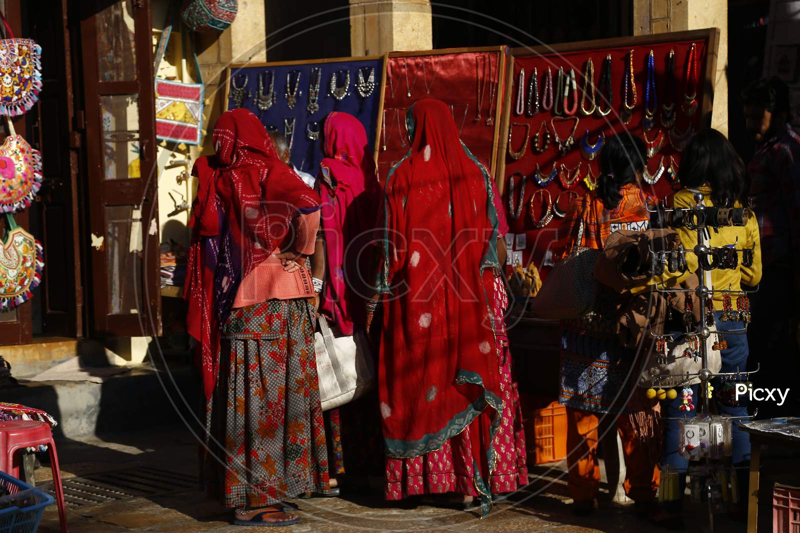 Rajasthani Woman Shopping in Stalls in Jaisalmer, India