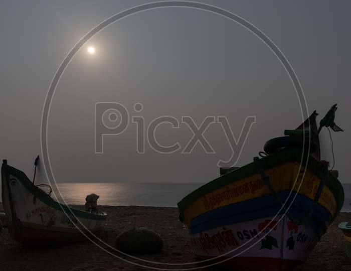 Moon Light At Beach With Fisherman Boat