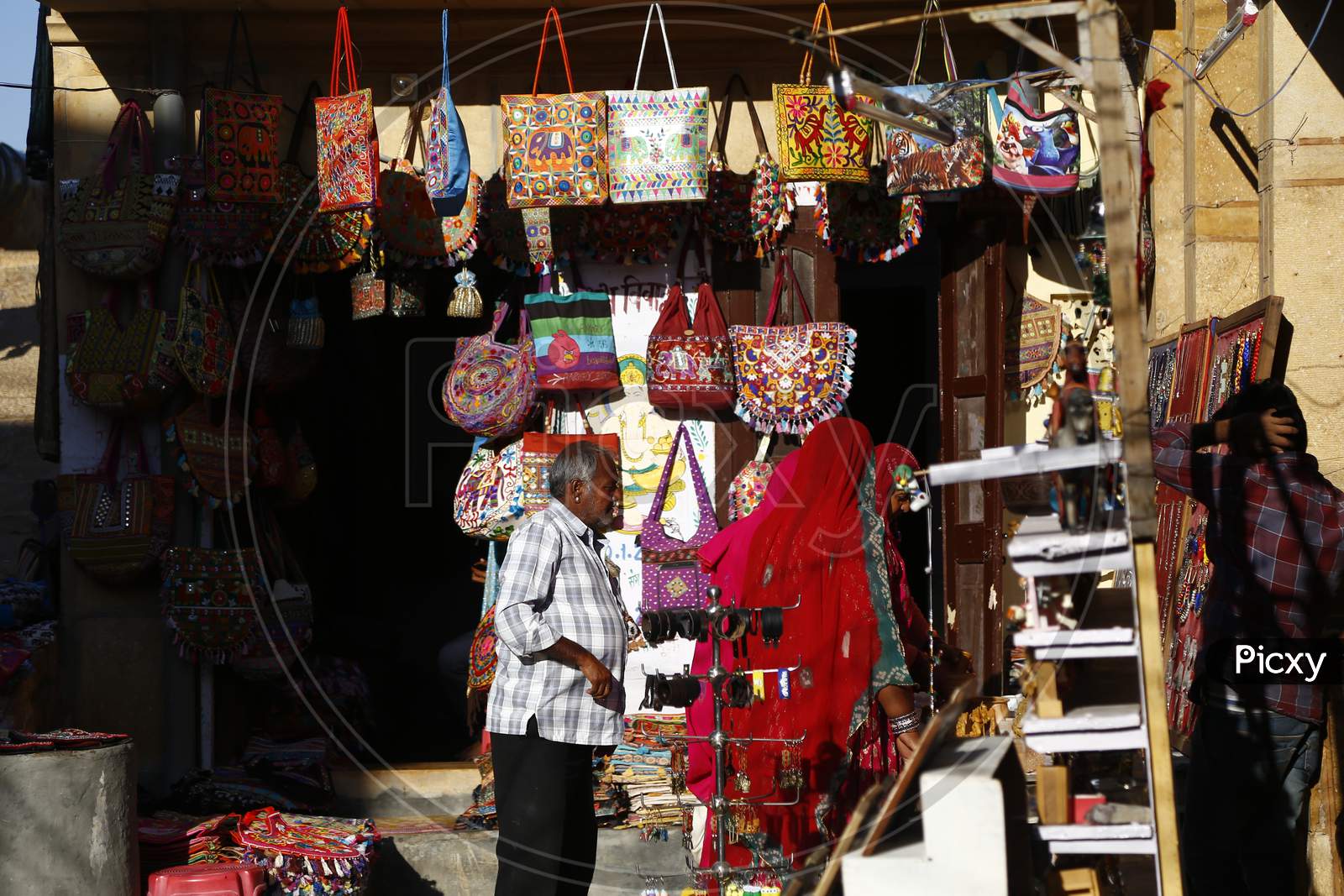 Rajasthani Woman Shopping in Stalls in Jaisalmer, India