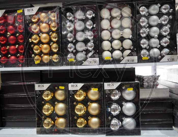 Dubai Uae December 2019 Beautiful Multicolored Christmas Balls In Christmas Market. Sale Of Christmas Decorations And Baubles In The Store. Christmas Ornaments Are In Plastic Boxes With Prices To Buy.