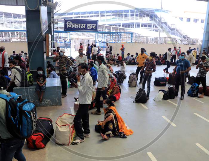Migrants From Mumbai Arrived By A Special Train Wait To Board Buses To Their Native Villages During Extended Nationwide Lockdown Amidst Coronavirus Or COVID-19 Pandemic In Prayagraj, May 25, 2020.