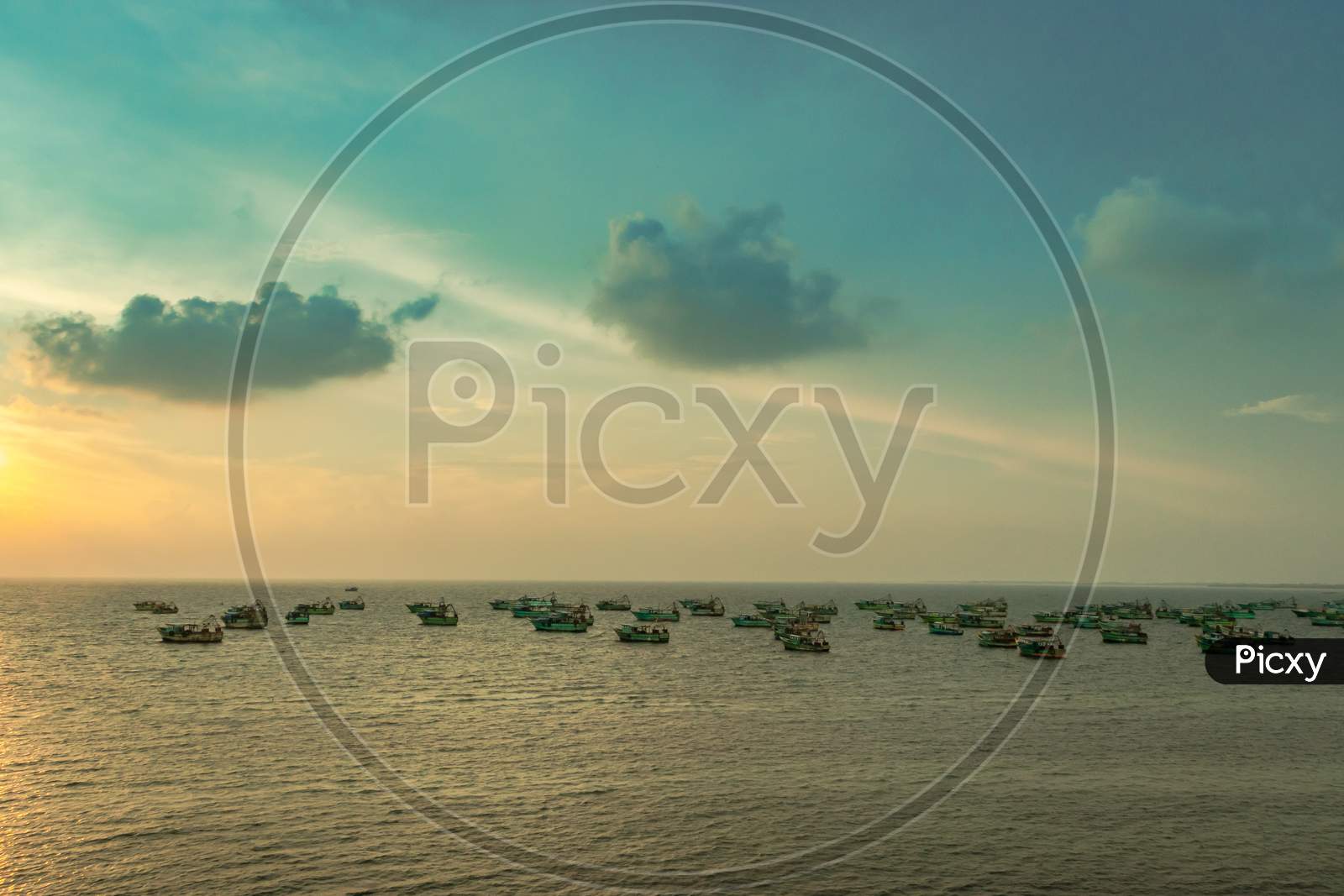 Sky View With Anchored Fishing Boats In Sea