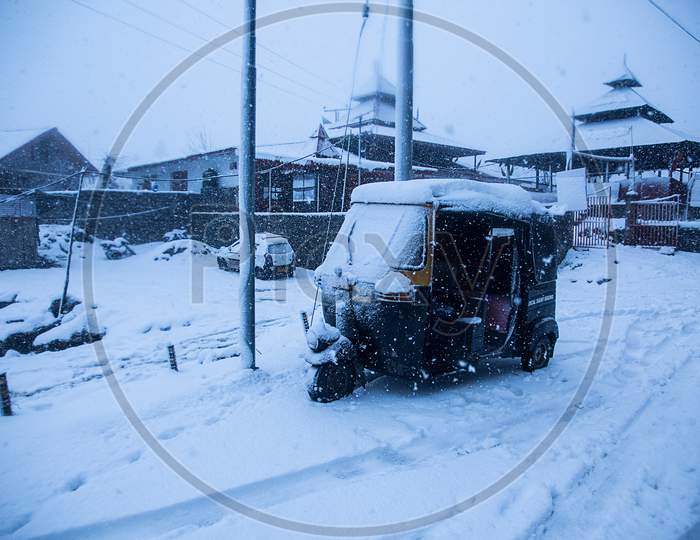 Manali, India - Jan 22, 2019: Auto Fully Covered With Thick Snow, Side View, Winter Concept. - Image
