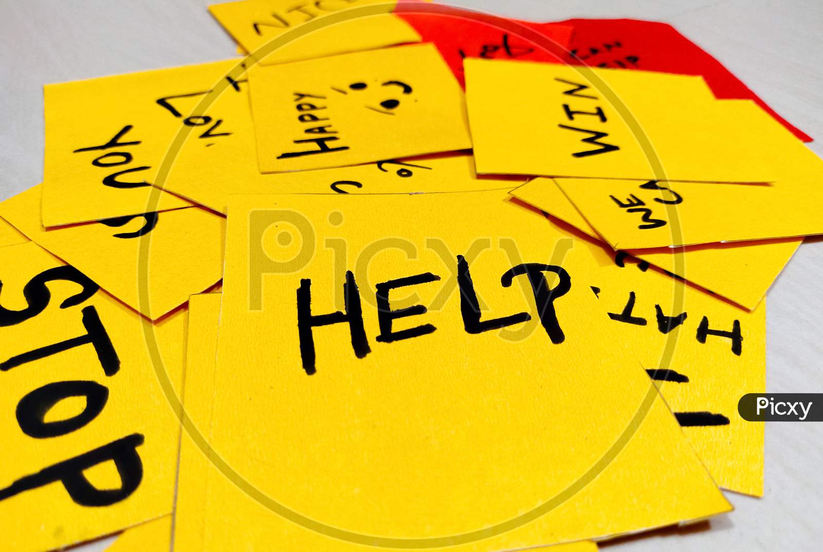 image-of-yellow-short-note-paper-with-written-words-help-kw910900-picxy