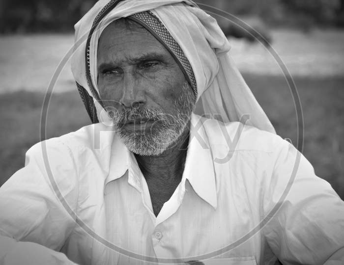 MADHYA PRADESH, INDIA - NOVEMBER 01, 2019: Black and white portrait of a Indian old man.