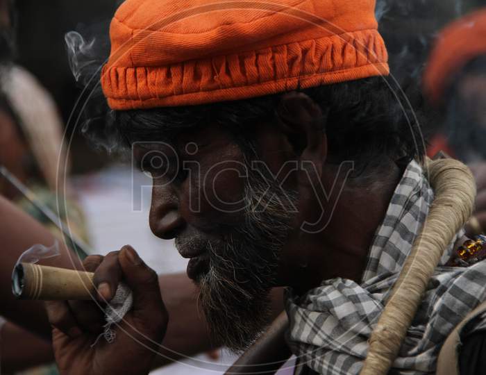 An Indian Man Smoking Ganja Or Weed or Marijuana