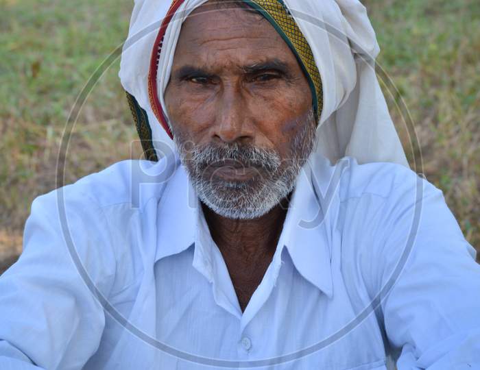 TIKAMGARH, MADHYA PRADESH, INDIA - NOVEMBER 01, 2019: Indian Village old man in traditional indian village dress.