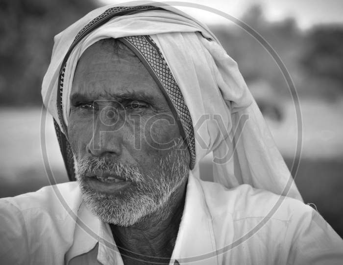 MADHYA PRADESH, INDIA - NOVEMBER 01, 2019: Black and white portrait of a Indian old man.