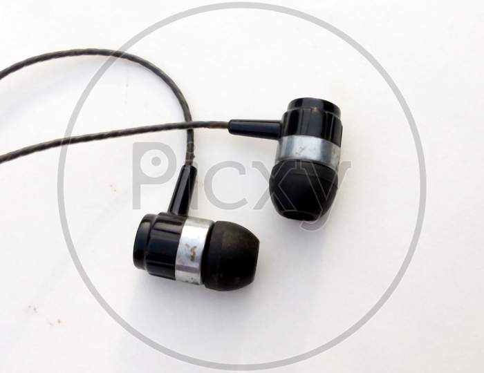 mart phone black ear phone isolated on white background