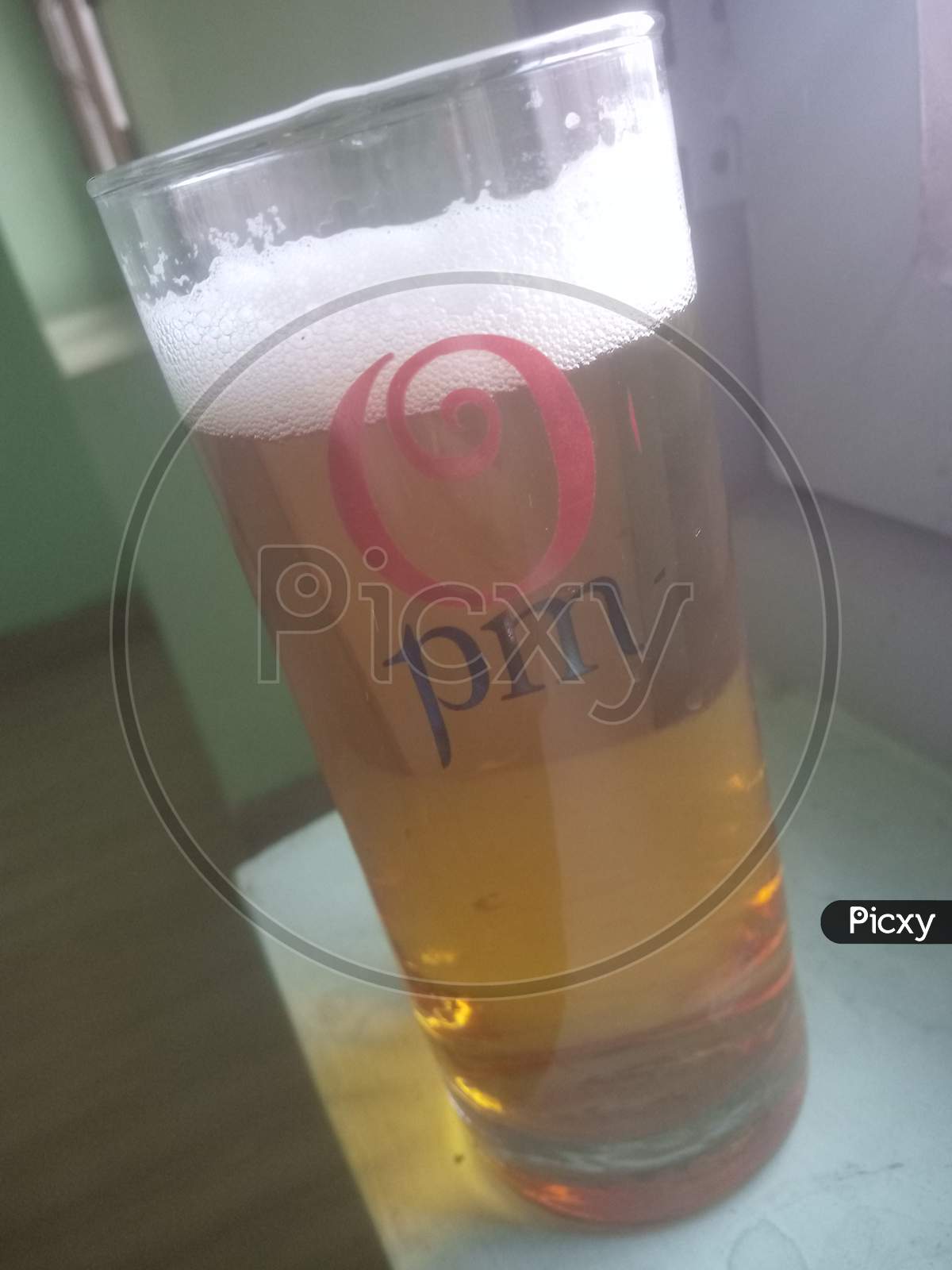 Drinking beer in Russian Vodka glass