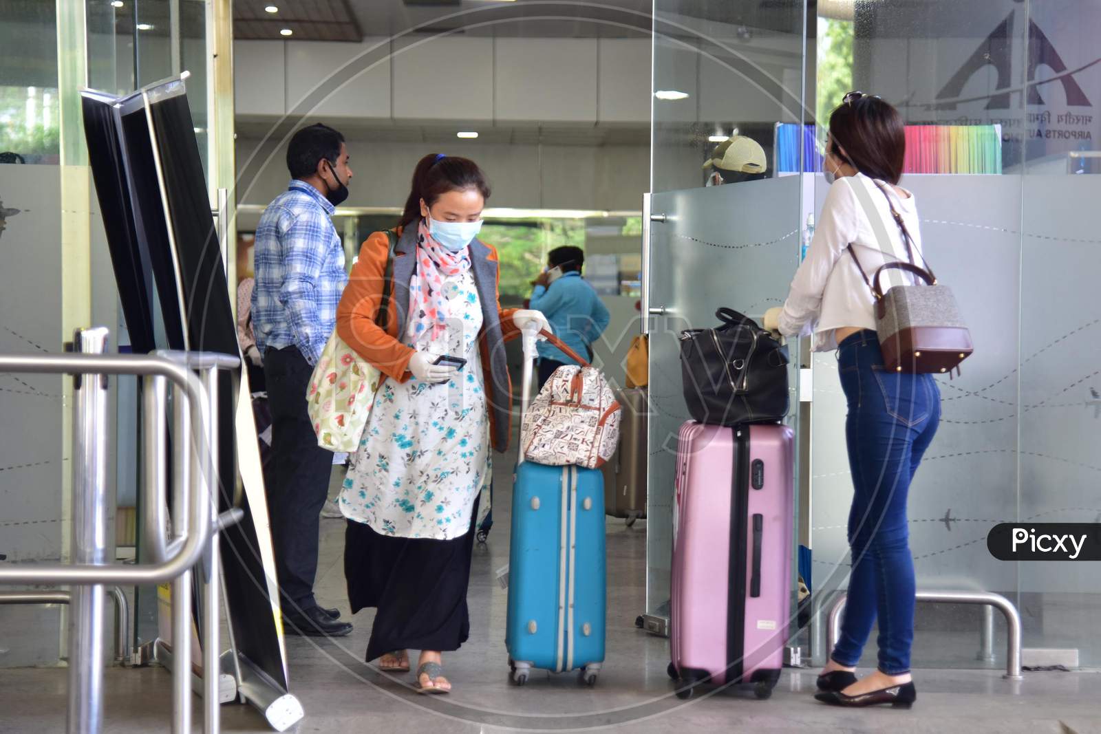 Passengers  Arrive At Lokpriya Gopinath Bordoloi International Airport, Following The Resumption Of Domestic Flights, In Guwahati On May 26,2020.