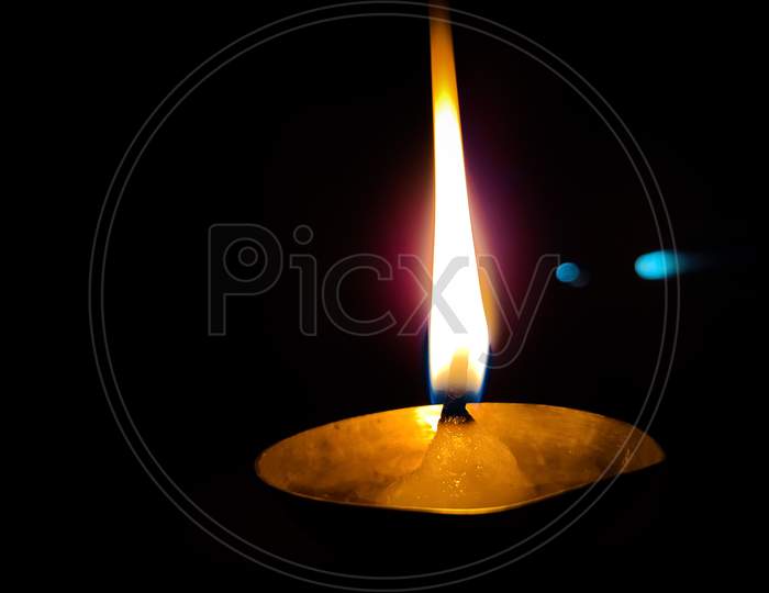 Handmade diya lamp lit during diwali celebration