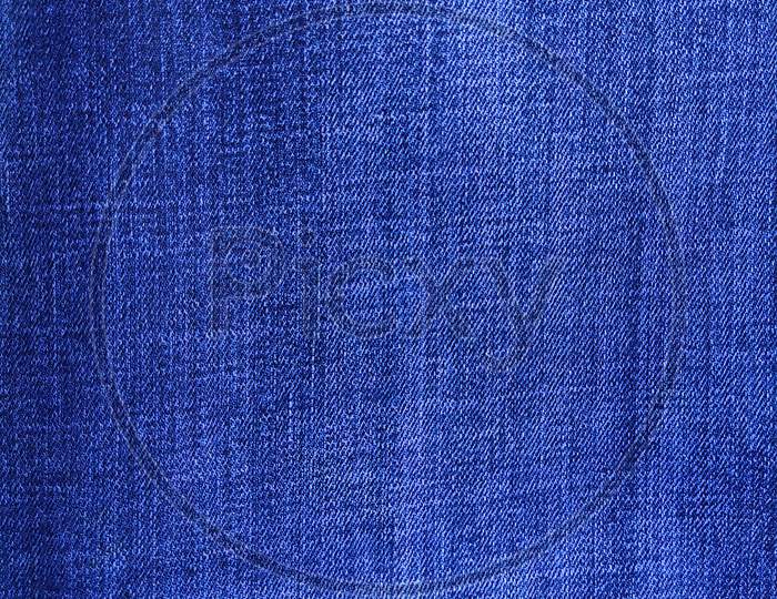 Closeup of denim jeans, texture background.