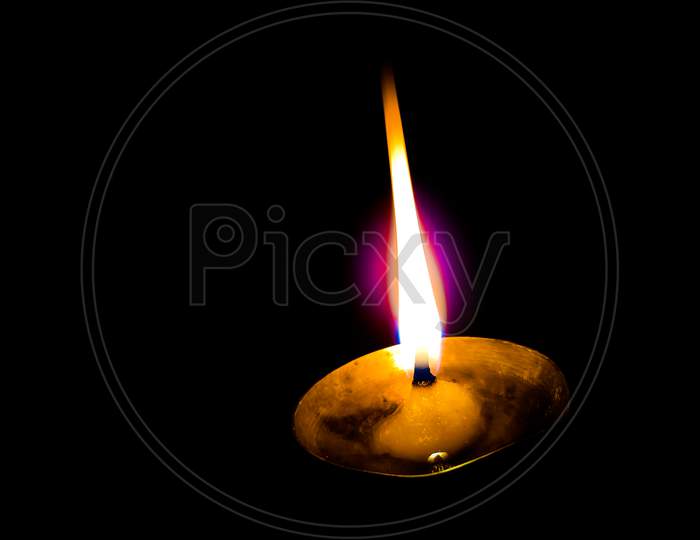 Handmade diya lamp lit during diwali celebration