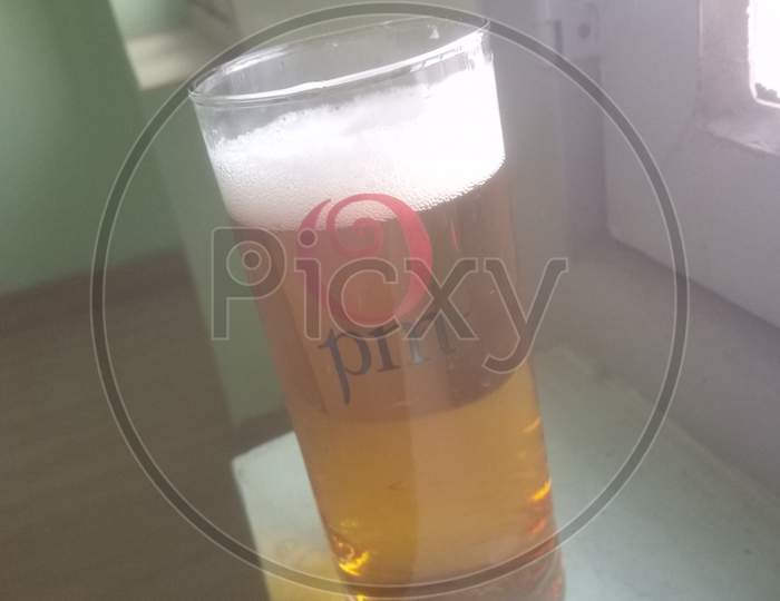 Drinking beer in wisky glass
