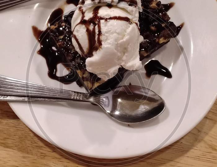 Chocolate Brownie With Vanilla And Chocolate Ice Cream