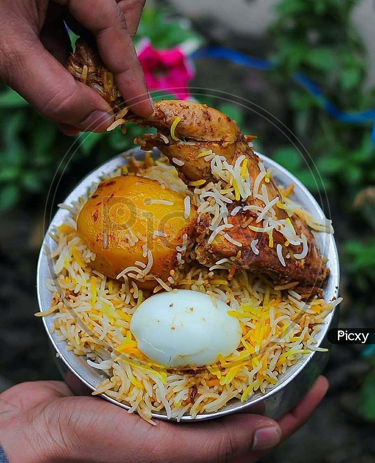 Homemade Chicken Biryani With Boil Egg And Spice Potato