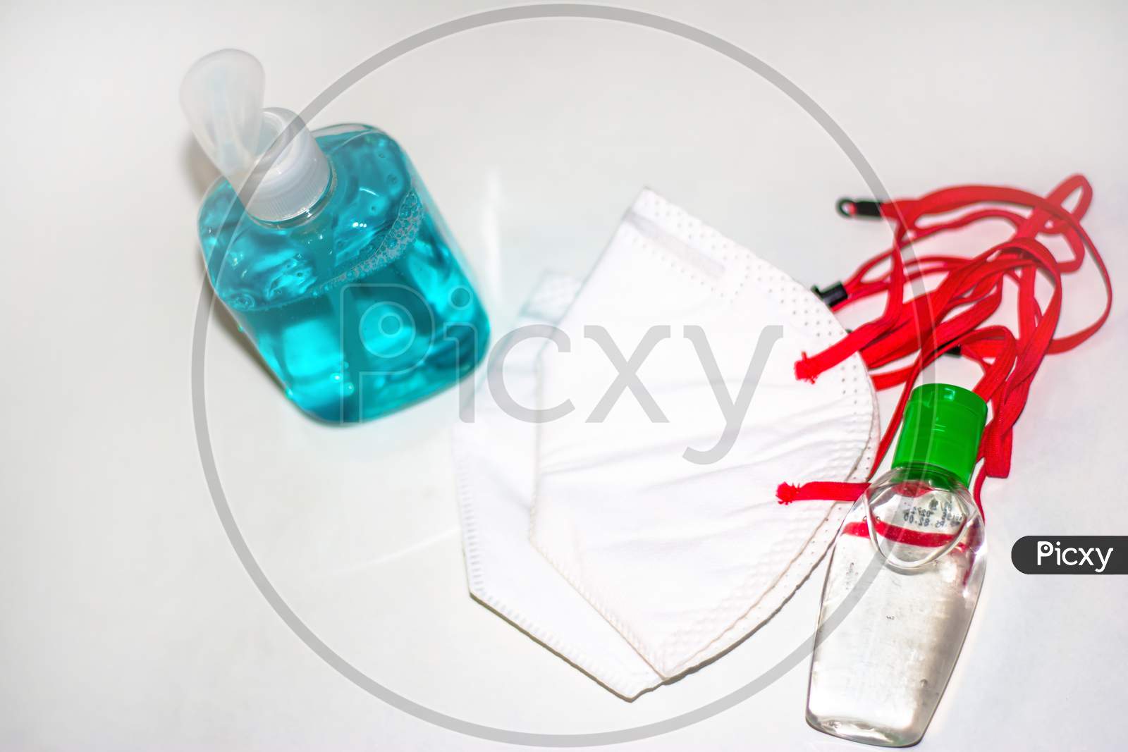 Corona virus prevention surgical masks, and hand sanitizer gel, liquid handwash soap for hand hygiene spread protection.